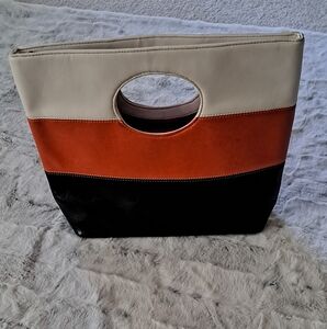 Cream, Black And Orange Color Block Hand Held Stand Purse.  13in X 10in.